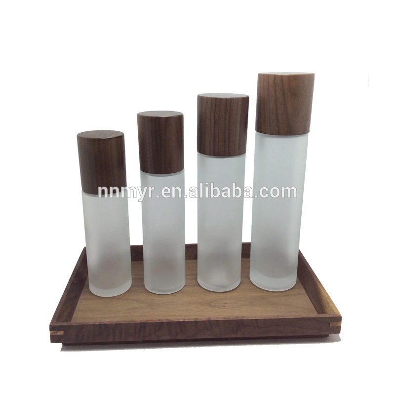 50ml 100ml 150ml Luxury unique shape clear cosmetic airless cosmetic bottle with serum pump Black wood cover