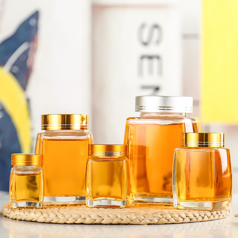 50ml 100ml 180ml 280ml 380ml 730ml wholesale clear hexagon food storage empty container glass jars and bottles honey