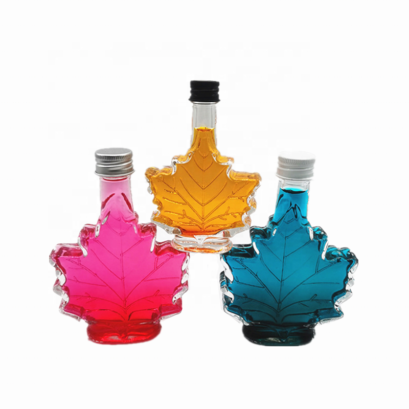 50ml 100ml 250ml maple leaf shape glass beverage/ whisky/ medicinal liquor bottle with screw lid