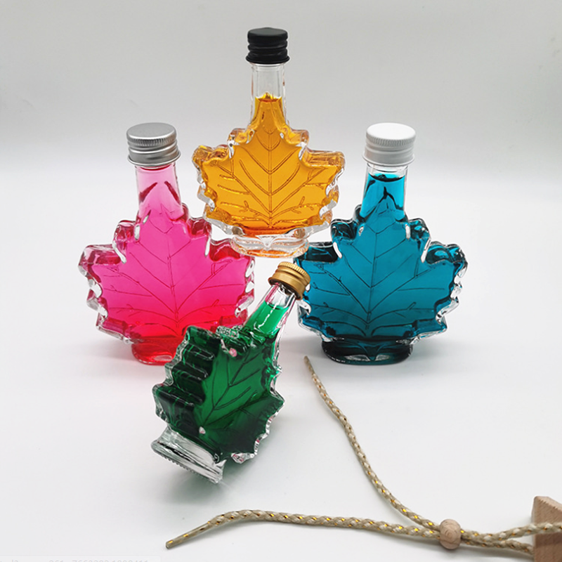 50ml 100ml 250ml maple leaf shape glass beverage/ whisky/ medicinal liquor bottle with screw lid