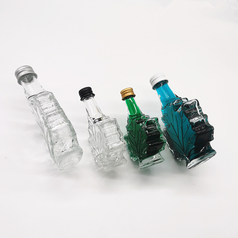50ml 100ml 250ml maple leaf shape glass beverage/ whisky/ medicinal liquor bottle with screw lid