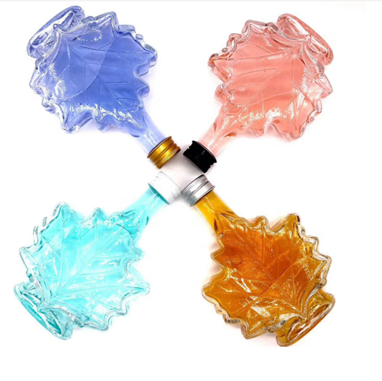 50ml 100ml 250ml maple leaf shape glass beverage/ whisky/ medicinal liquor bottle with screw lid