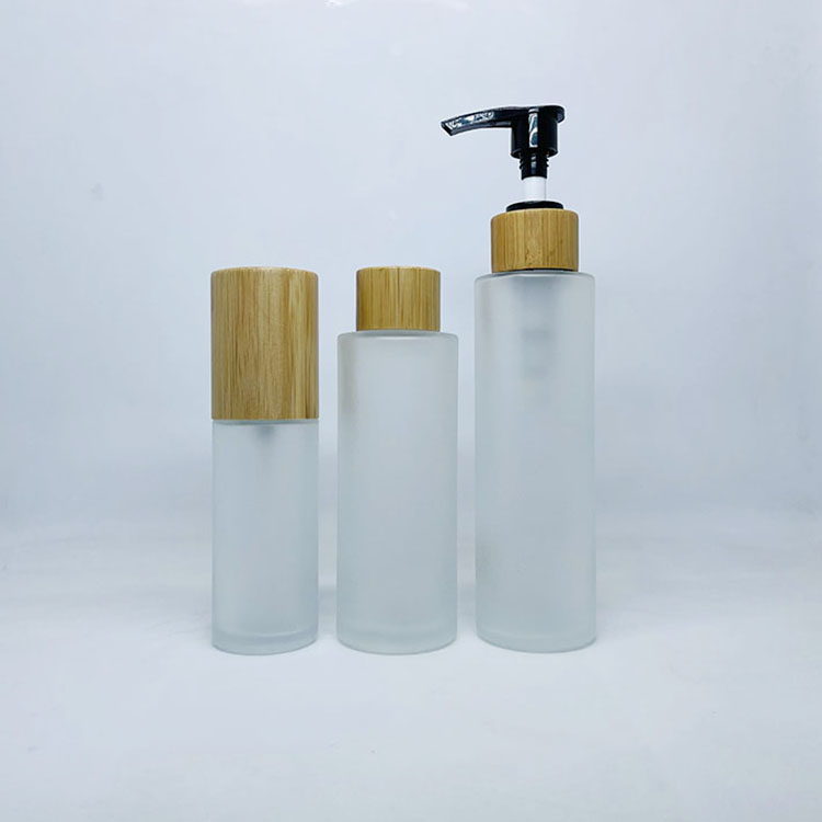50ml 100ml Frosted glass cosmetic bottle with bamboo pump spray caps container