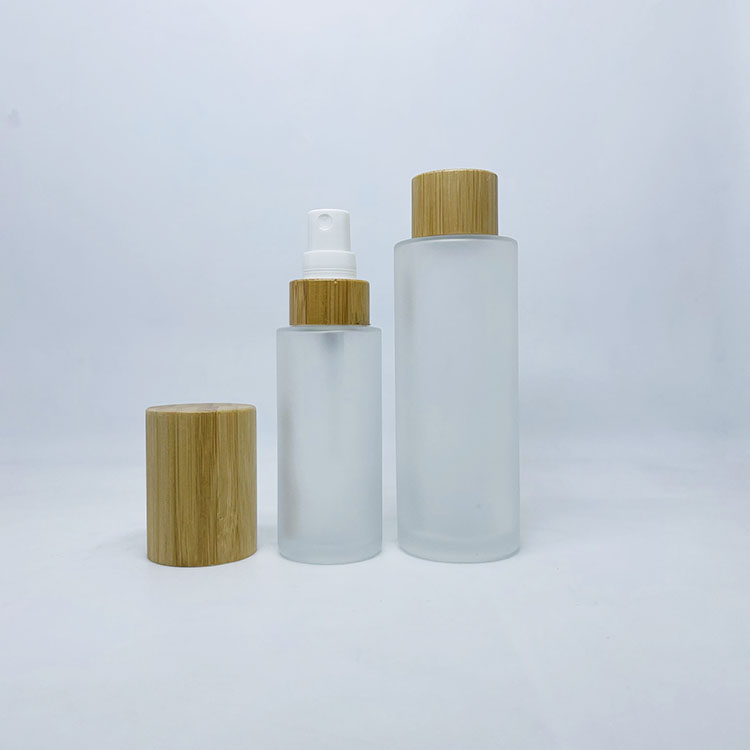 50ml 100ml Frosted glass cosmetic bottle with bamboo pump spray caps container