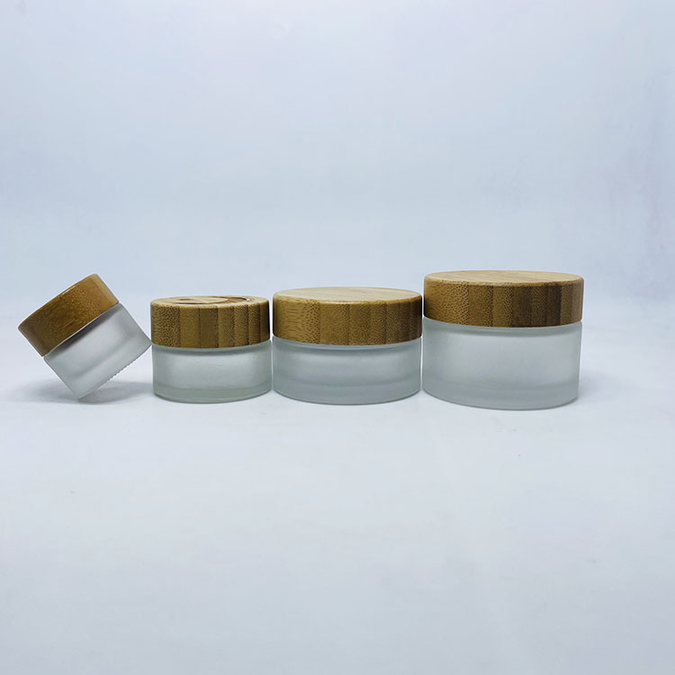 50ml 100ml Frosted glass cosmetic bottle with bamboo pump spray caps container
