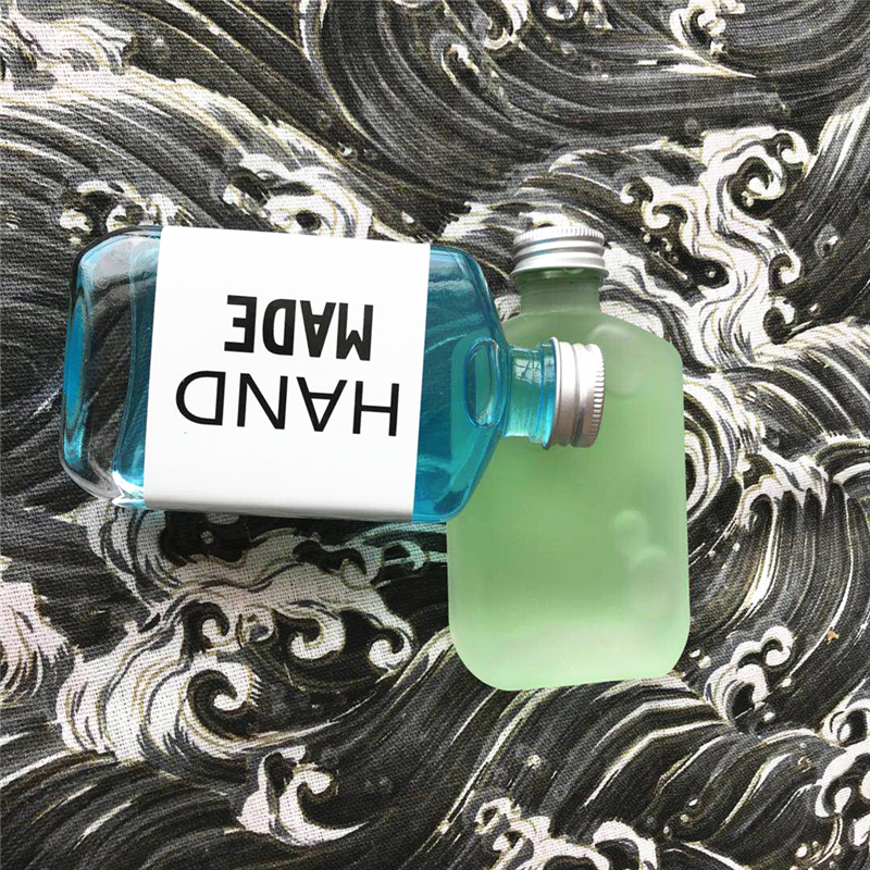 50ml-500ml Customized LOGO Elegant Liquor Glass Bottle,transparent or frosted glass bottle,whisky/wine/juice bottle