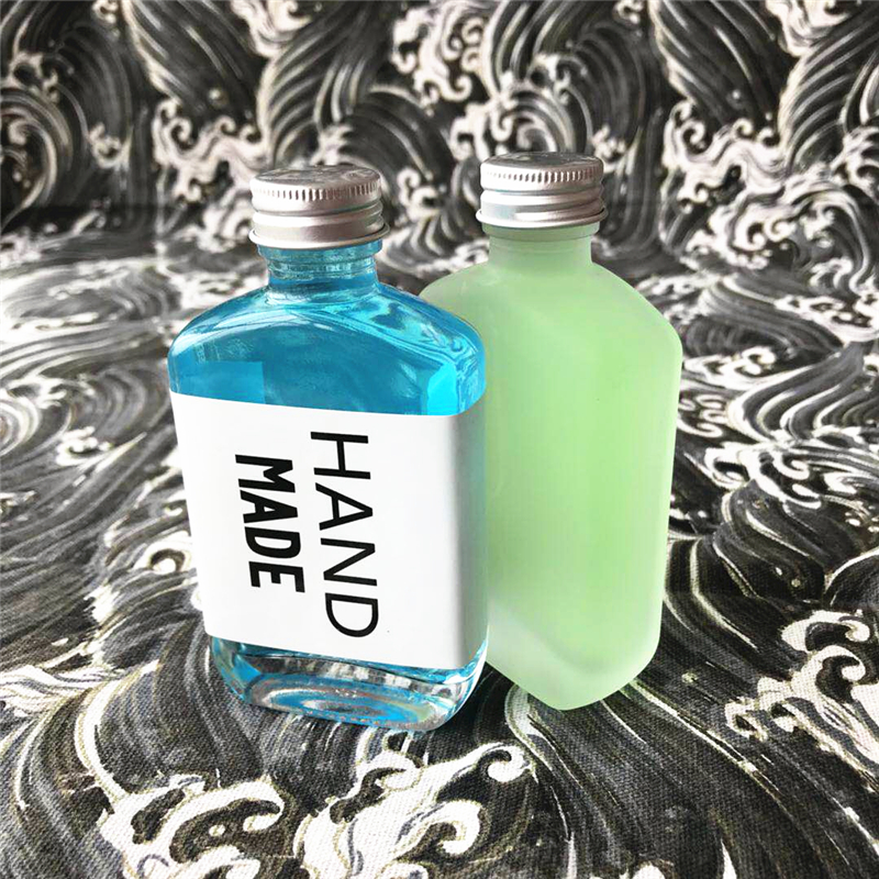 50ml-500ml Customized LOGO Elegant Liquor Glass Bottle,transparent or frosted glass bottle,whisky/wine/juice bottle