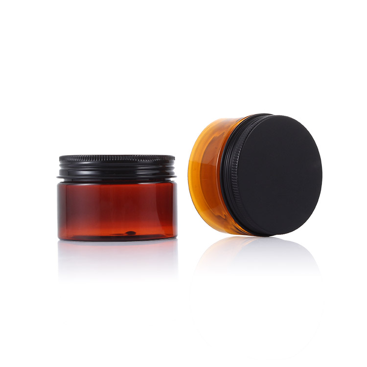 50ml 60ml 100ml Amber round pet plastic cosmetic jar with Black Aluminium Lid