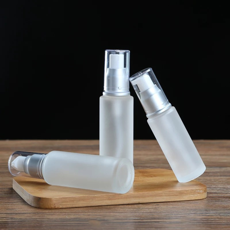 50ml 60ml transparent frosted cylinder glass serum lotion bottles with treatment pump