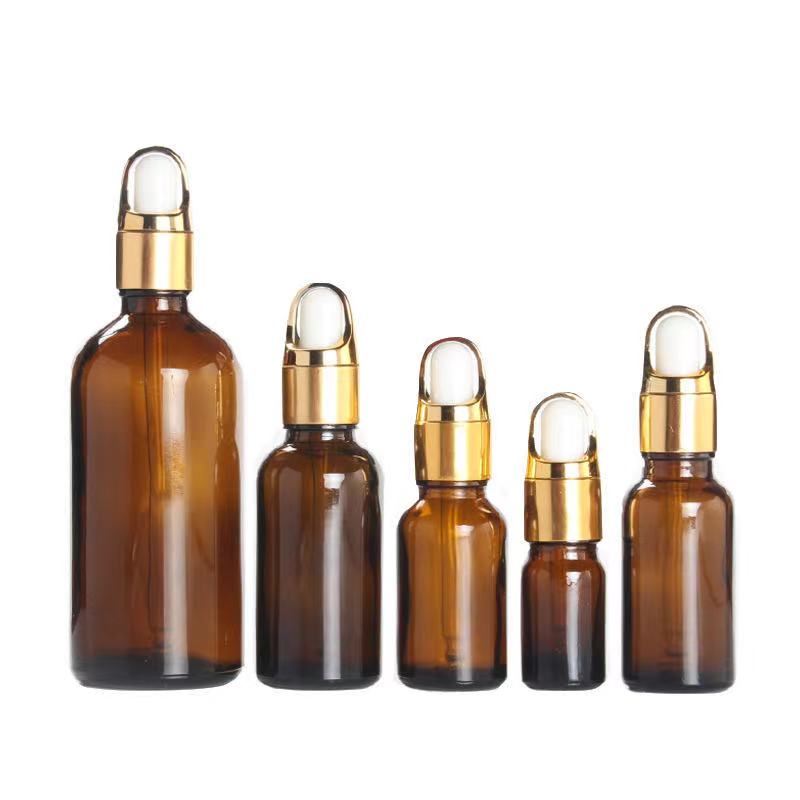 50ml amber glass essential oil dropper bottle with gold flower basket lid cap
