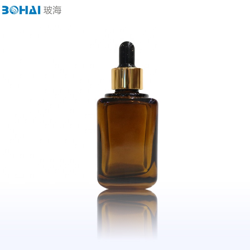 50ml amber square essential oil glass bottle with shiny gold cap black rubber dropper popular brown dropper glass bottle