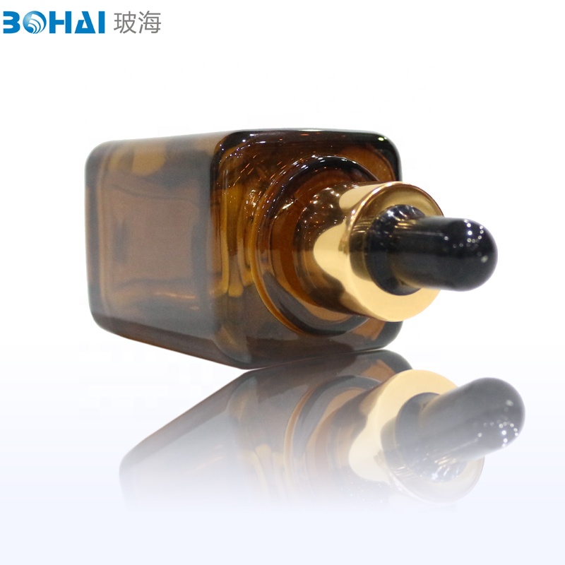 50ml amber square essential oil glass bottle with shiny gold cap black rubber dropper popular brown dropper glass bottle