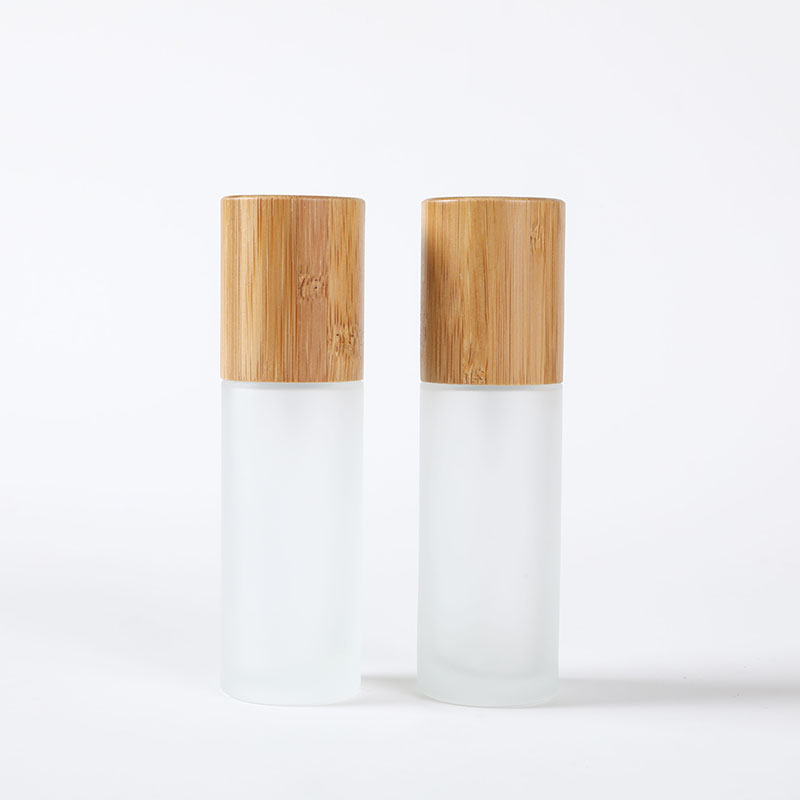 50ml bamboo lid glass  bottle frosted glass lotion pump bottle with bamboo lid
