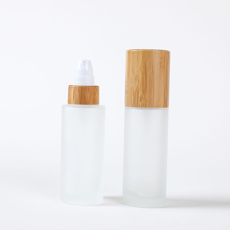 50ml bamboo lid glass bottle frosted glass lotion pump bottle with bamboo lid