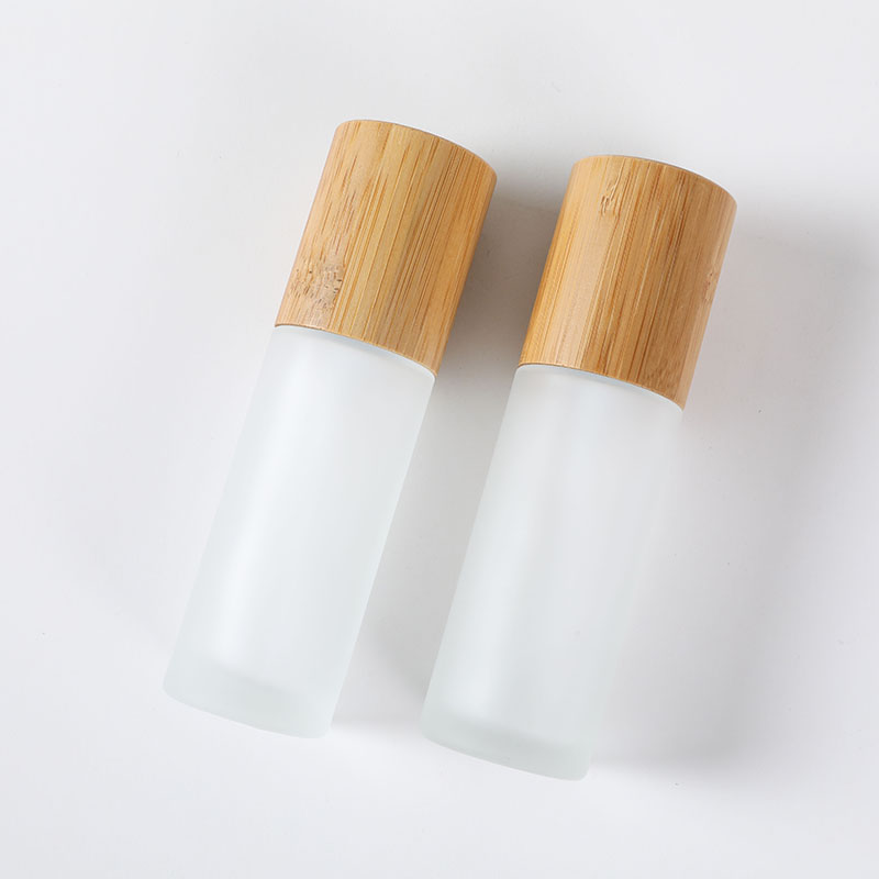 50ml bamboo lid glass bottle frosted glass lotion pump bottle with bamboo lid