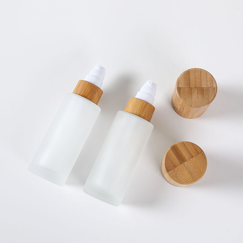 50ml bamboo lid glass bottle frosted glass lotion pump bottle with bamboo lid