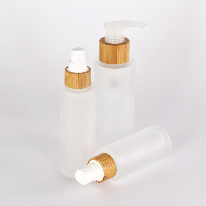 50ml bamboo lid glass bottle frosted glass lotion pump bottle with bamboo lid