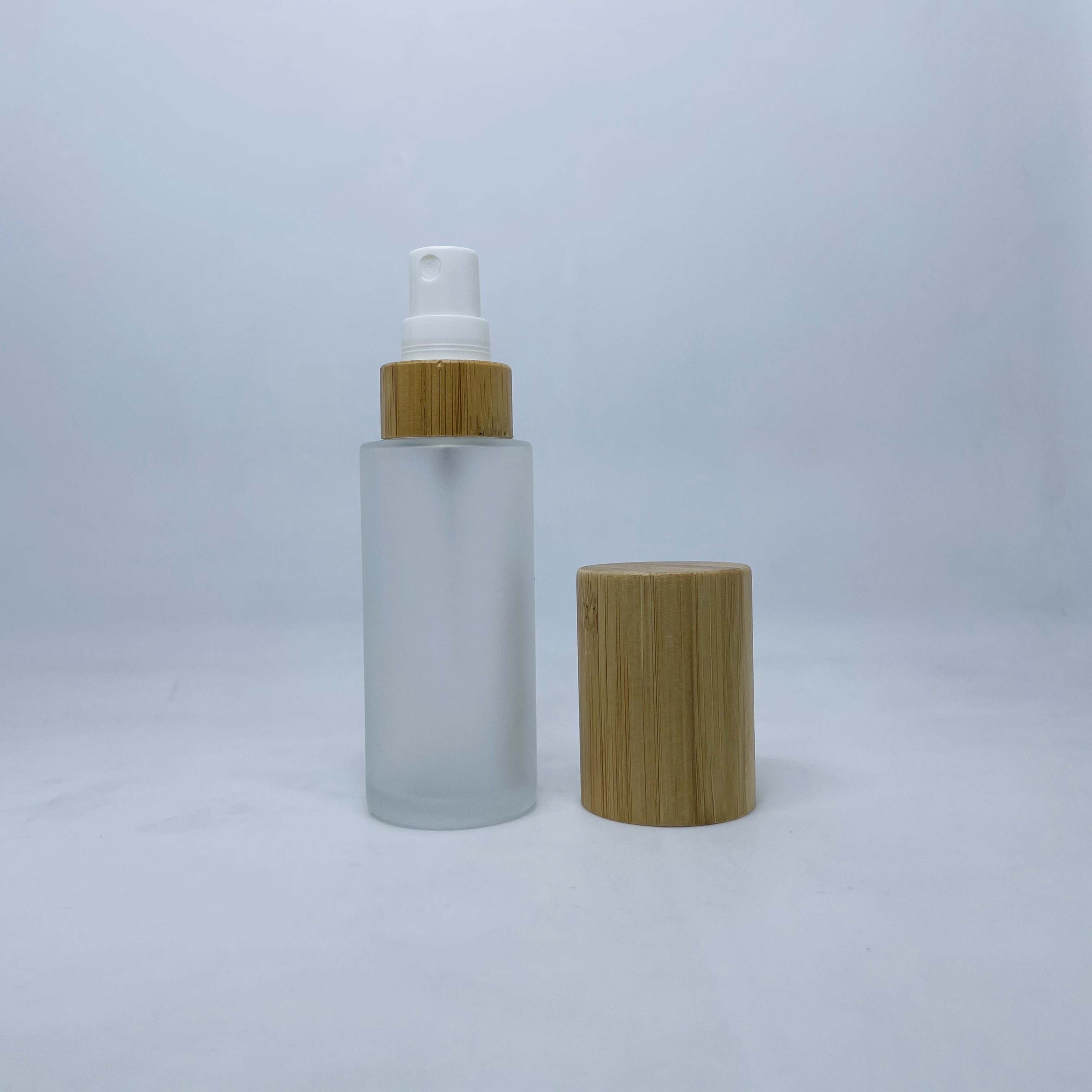50ml bamboo lid glass bottle frosted glass lotion pump bottle with bamboo lid