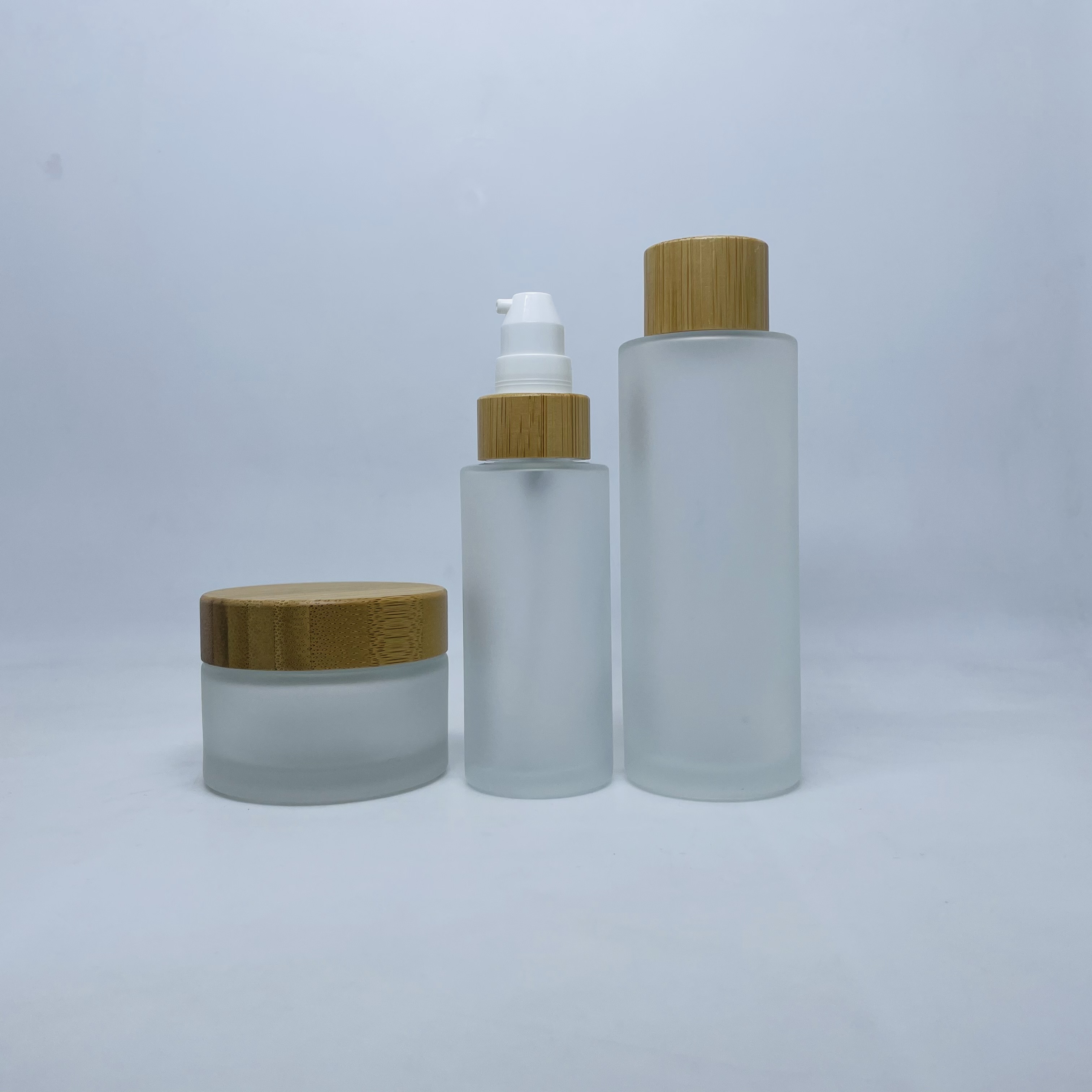 50ml bamboo lid glass bottle frosted glass lotion pump bottle with bamboo lid