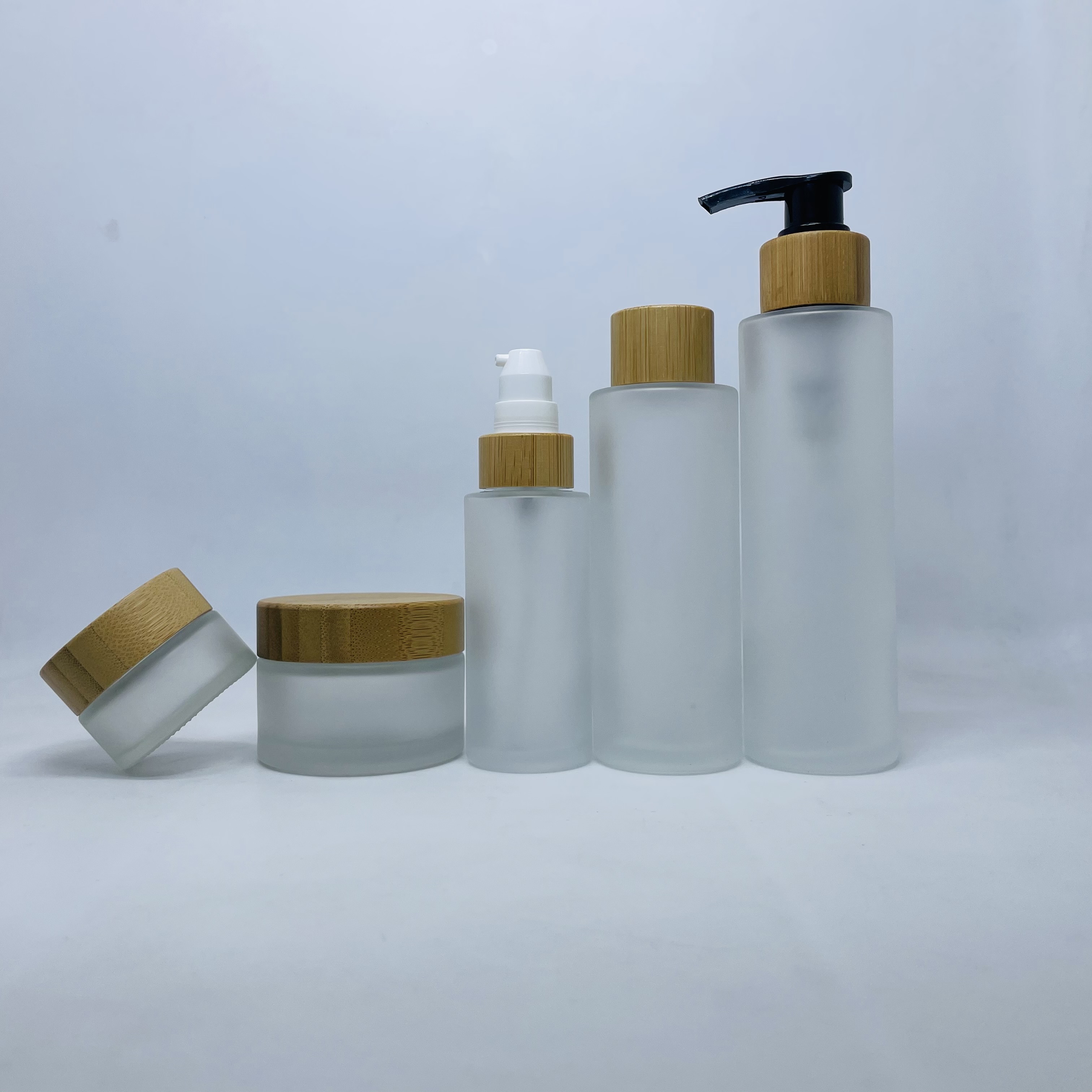 50ml bamboo lid glass bottle frosted glass lotion pump bottle with bamboo lid