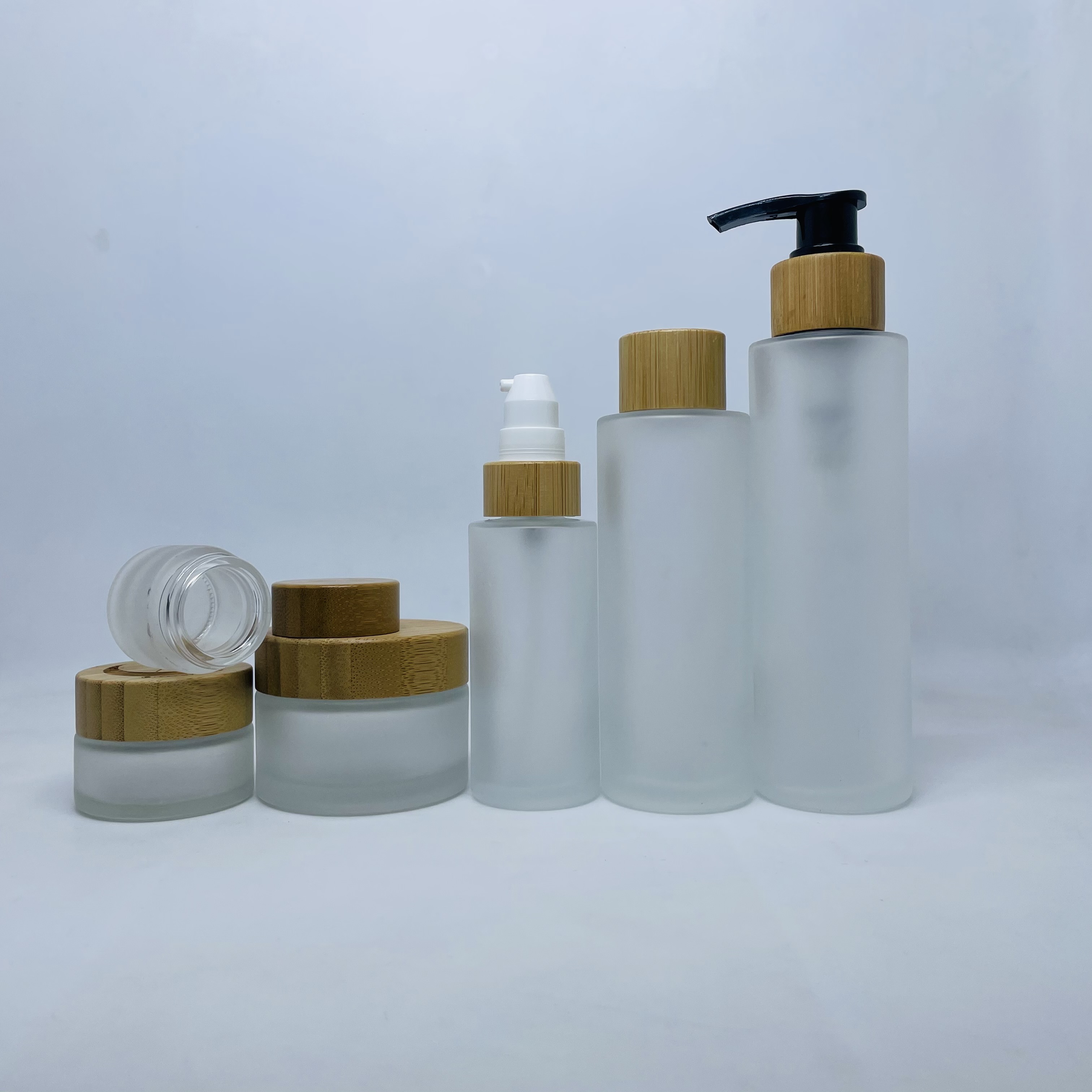 50ml bamboo lid glass bottle frosted glass lotion pump bottle with bamboo lid