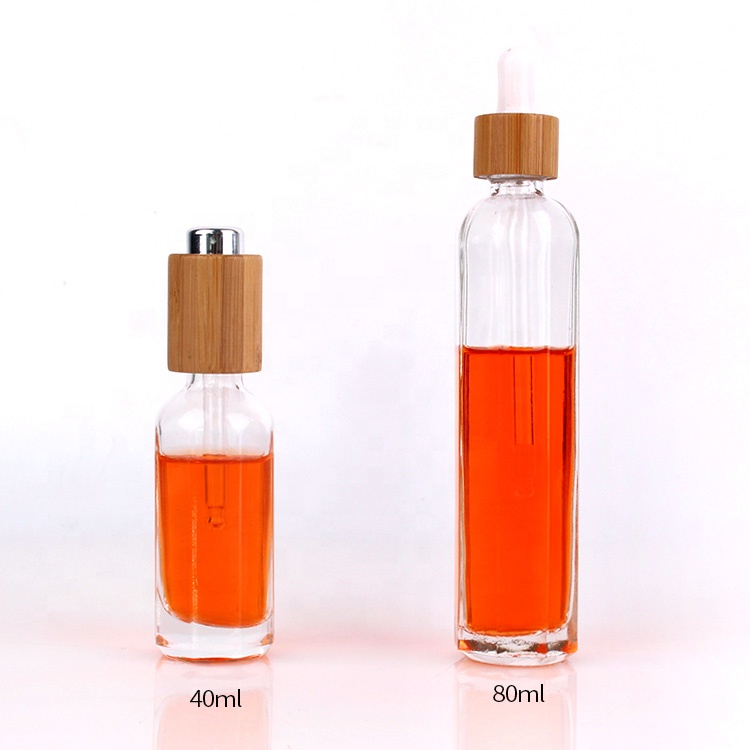 50ml clear empty lotion glass bottle with press pump bamboo lid