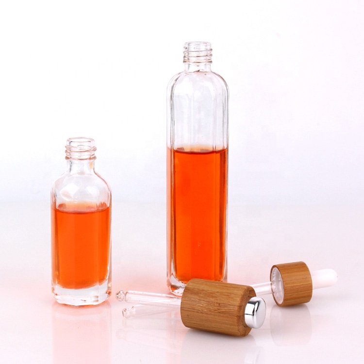 50ml clear empty lotion glass bottle with press pump bamboo lid