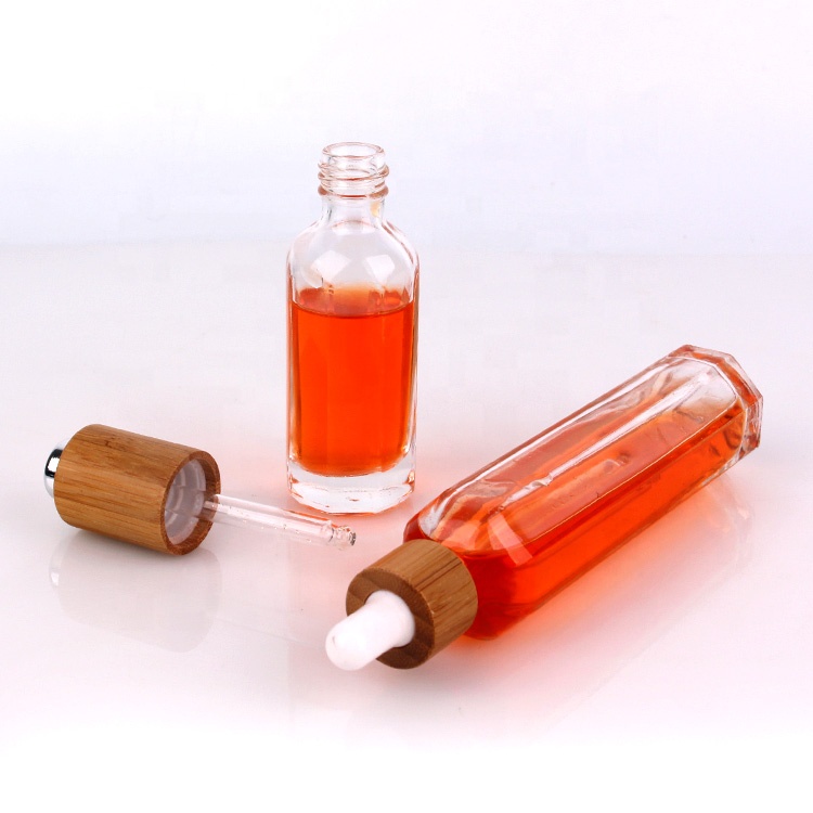 50ml clear empty lotion glass bottle with press pump bamboo lid