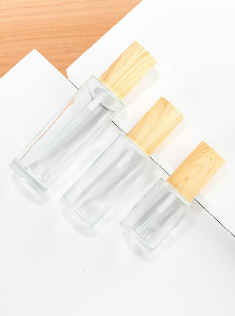 50ml frosted amber dropper glass bottle with bamboo cap for essential oil serum cosmetic packaging