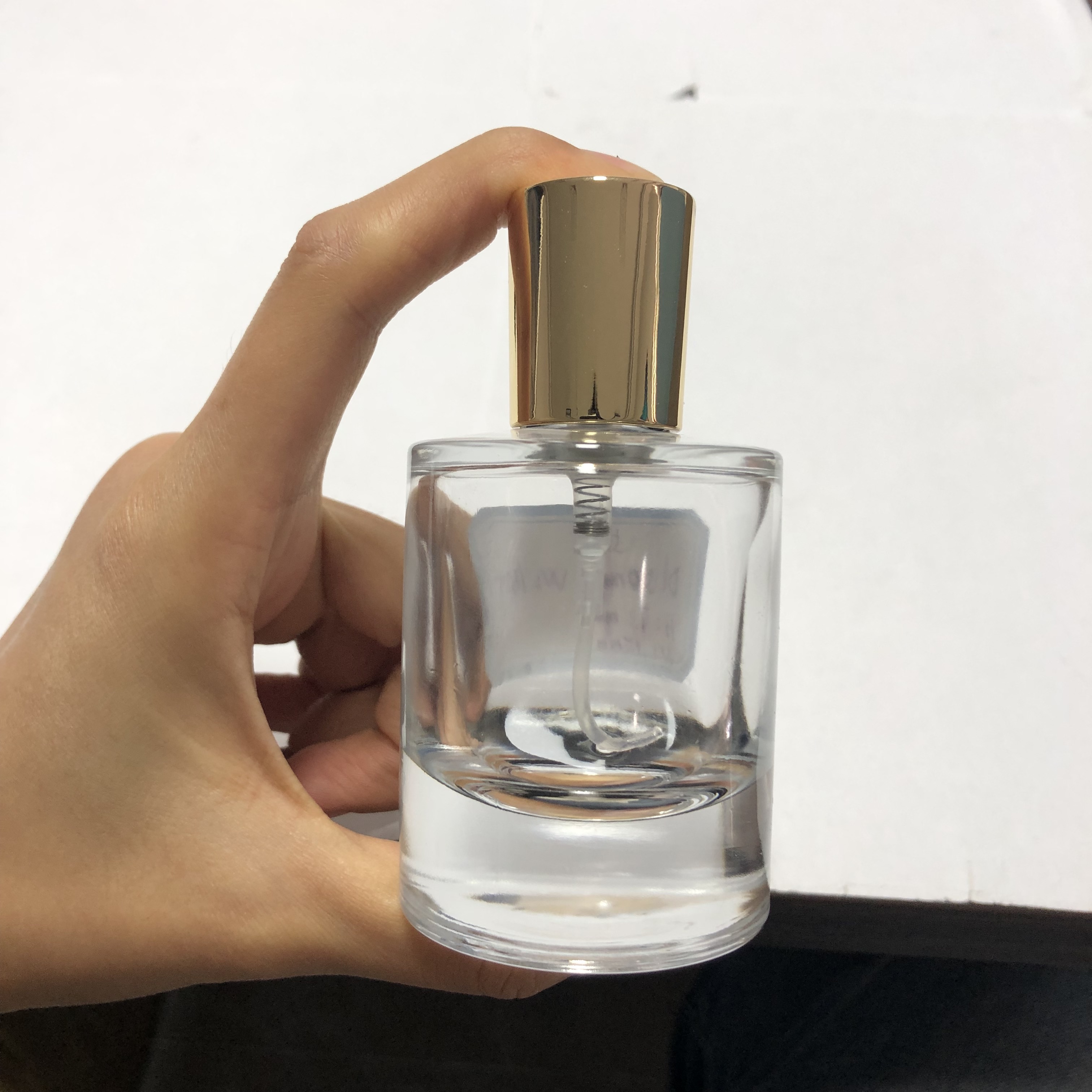50ml high premium quality round glass perfume bottle with thick bottom and 15mm neck finish wholesale