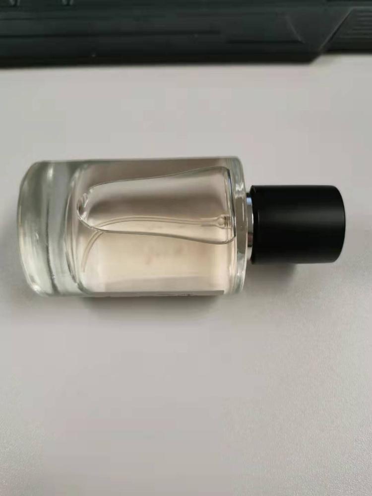 50ml simple elegant glass perfume bottle perfume spray bottle with embossed logo and thick bottom