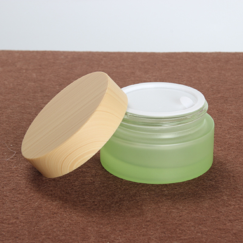 5g 10g 15g 20g 25g 30g 50g 60g 100g round shape green glass jar for scrubs eye cream cosmetic packaging bottle with bamboo lid