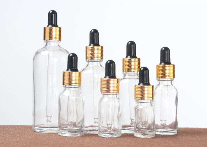5ml/10ml/15ml/20ml/30ml/50ml/100ml Clear Glass Bottle with Dropper Essential Oil Cosmetic Dropper Bottle With Gold Cap