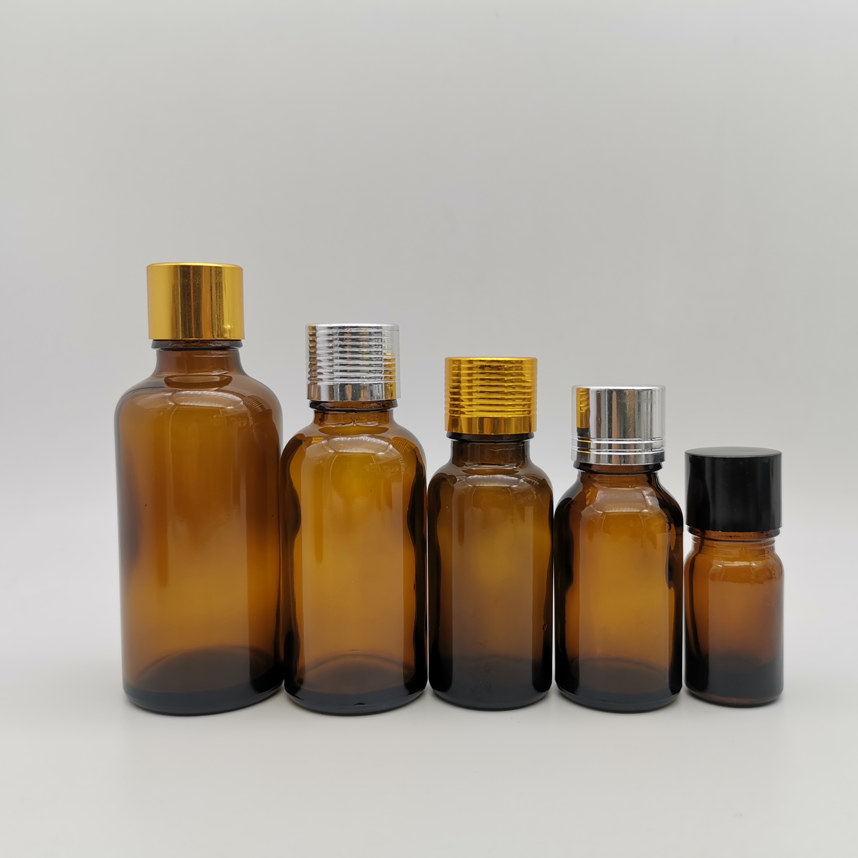 5ml 10ml 15ml 20ml 30ml 50ml 100ml amber frosted glass essential oil bottle with gold cap
