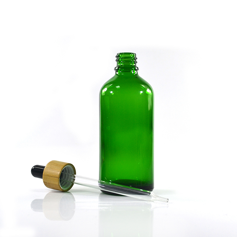 5ml 10ml 15ml 20ml 30ml 50ml 100ml customized essential oil green glass dropper bottle with bamboo cap