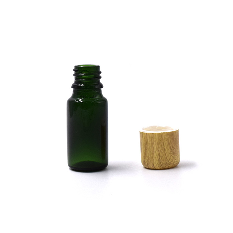 5ml 10ml 15ml 20ml 30ml 50ml 100ml dark green face essential oil glass serum bottle with wooden plastic cap