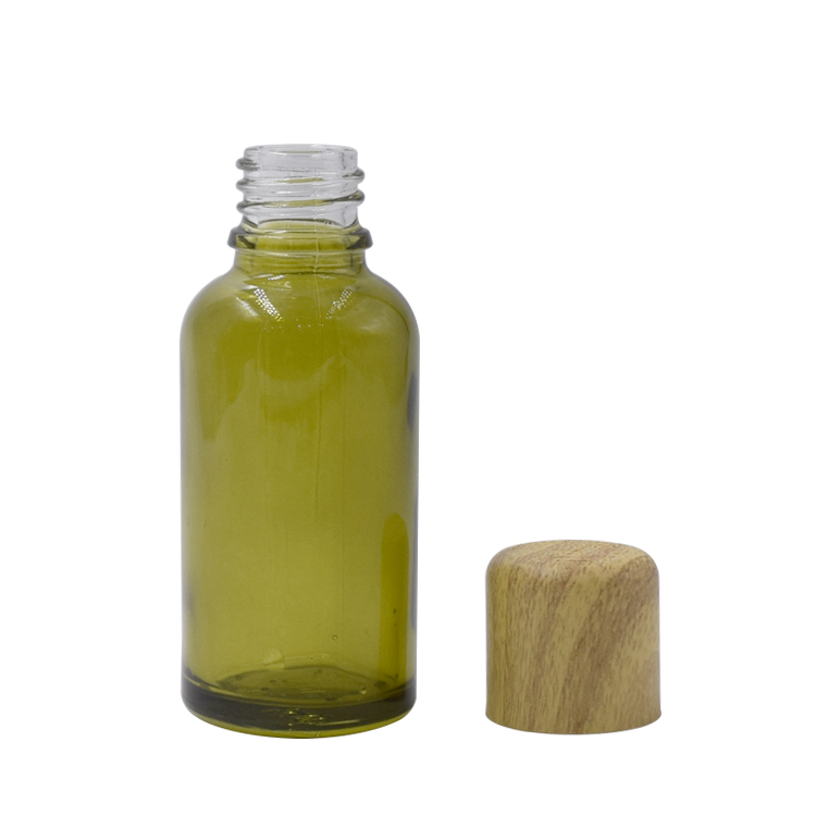 5ml 10ml 15ml 20ml 30ml 50ml 100ml dark green face essential oil glass serum bottle with wooden plastic cap