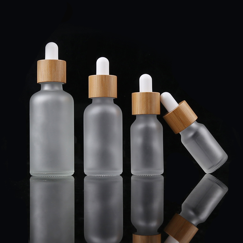 5ml 10ml 15ml 20ml 30ml 50ml 100ml frosted glass essential oil bottle with bamboo lid glass dropper bottle