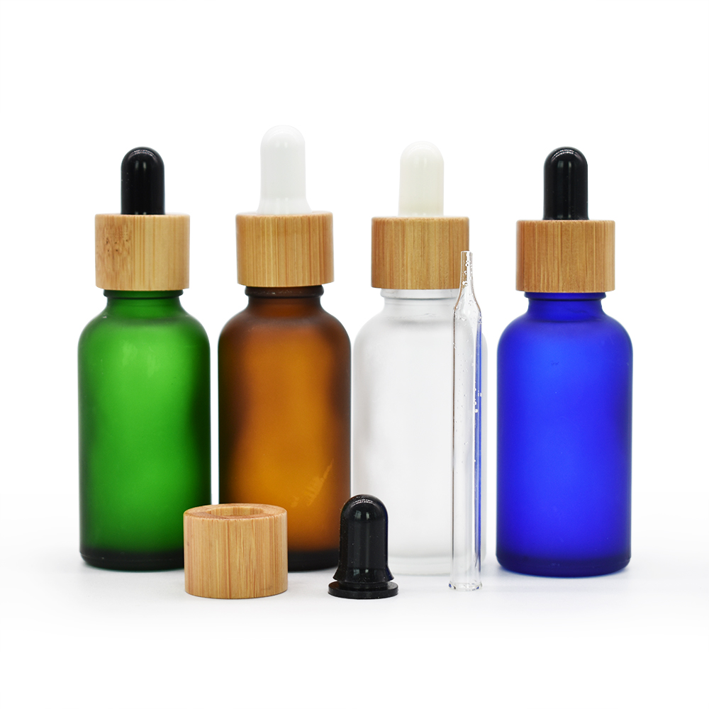 5ml 10ml 15ml 20ml 30ml 50ml 100ml frosted green blue amber clear essential oil glass dropper bottle with bamboo lid
