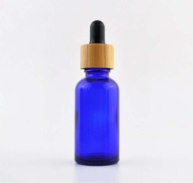 5ml 10ml 15ml 20ml 30ml 50ml 100ml frosted green blue amber clear essential oil glass dropper bottle with bamboo lid