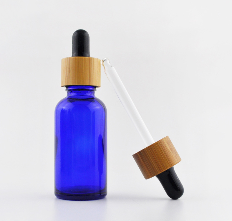 5ml 10ml 15ml 20ml 30ml 50ml 100ml frosted green blue amber clear essential oil glass dropper bottle with bamboo lid