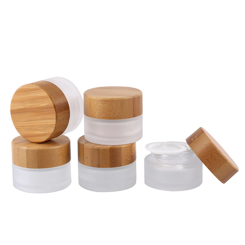 5ml 15ml 30ml 50ml 100ml Tarros cosmeticos de vidrio esmerilado con tapa de madera para crema corporal