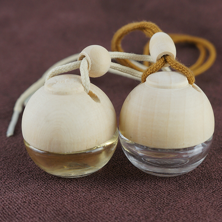 5ml Wholesale cheap empty hanging car perfume bottle with wooden cap, air freshener glass bottle
