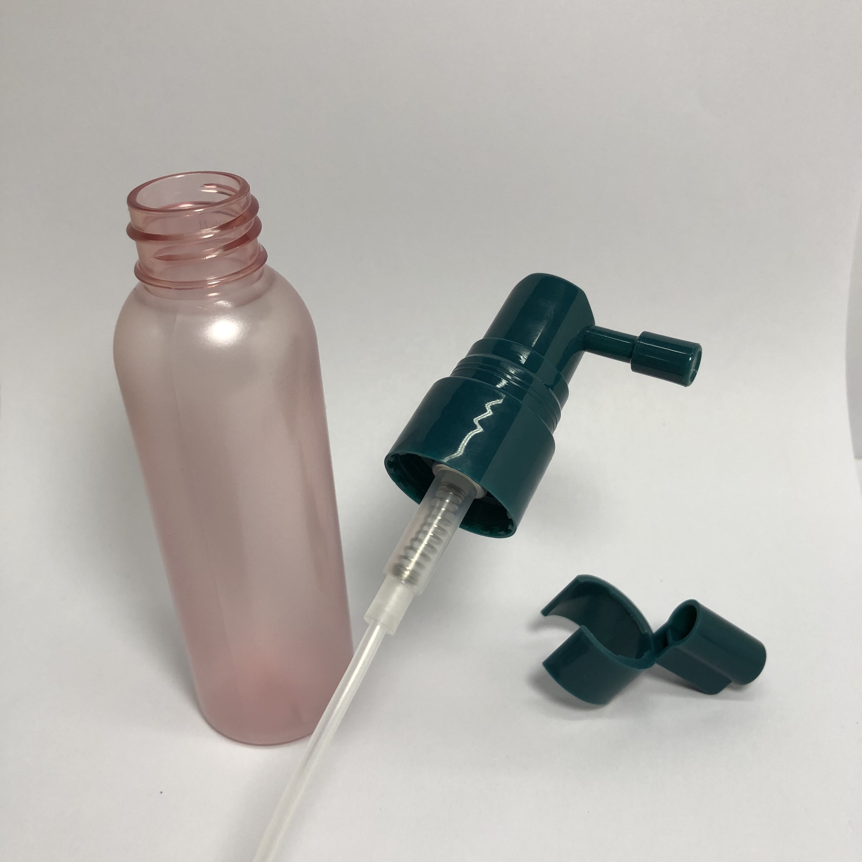 60ml pink semi-transparent plastic bottle with 20mm green sprayer pump