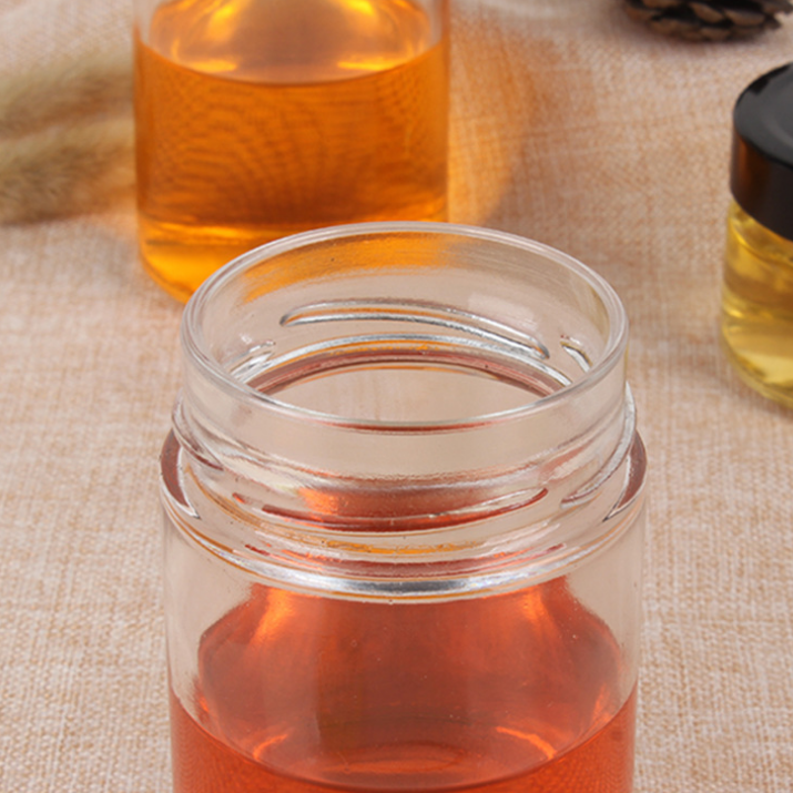 7 oz Clear Ergo 212ml Honey Round Glass Jar Metal Lid Lug Cap Black
