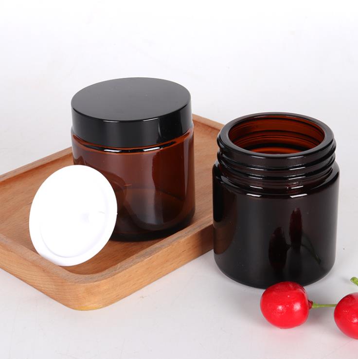 9 oz amber glass straight-sided round jar with 70-400 black metal lid