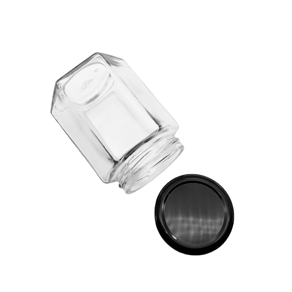 A cheap and durable hexagonal glass hexagonal glass jar with metal lid