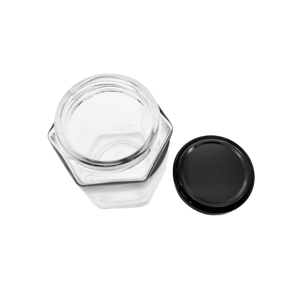 A cheap and durable hexagonal glass hexagonal glass jar with metal lid