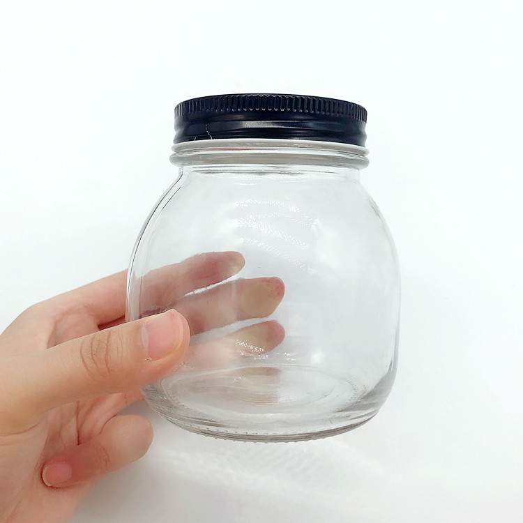 A large number of wholesale clear sealed glass jar for canned food with cap 500ml