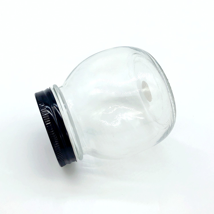 A large number of wholesale clear sealed glass jar for canned food with cap 500ml